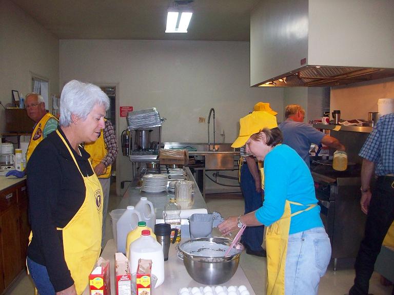 Sharon & Denise preparing pancakes